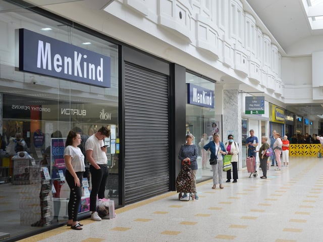 Outside MenKind in The Beacon