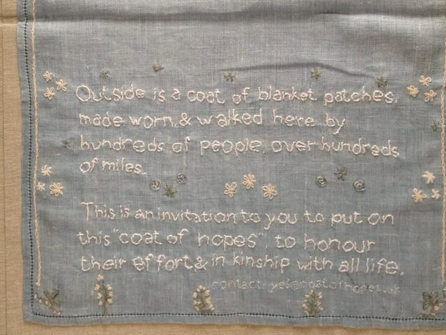 The hand embroidered invitation to COP delegates SUS-210311-134606001