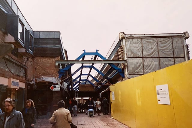 The shopping centre was open air before the work in 1989