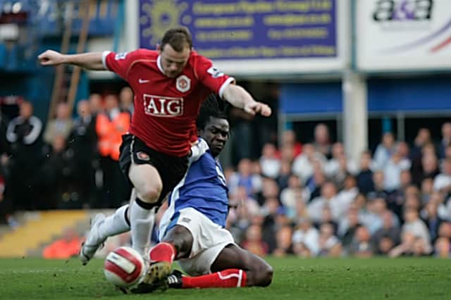 Wayne Rooney is thwarted by a perfectly timed Linvoy Primus tackle - an incident remembered by a number of people who voted in the defenders' poll / Picture: Barry Zee