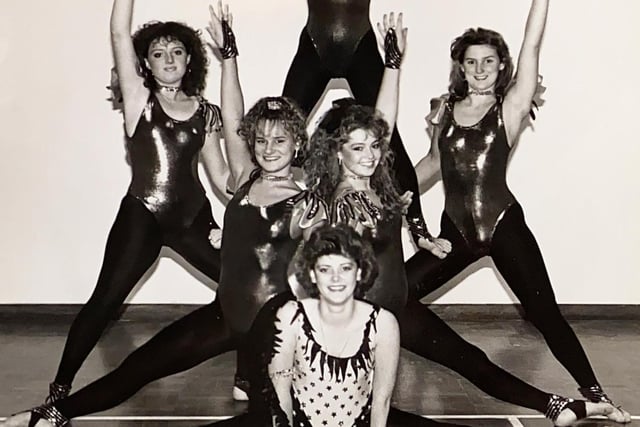 Gymnasts strike a pose -  Do you recognise anyone in the picture?