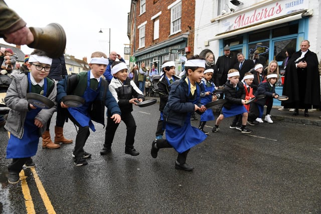 Action from the Olney Pancake Day race 2022. Photos: Jane Russell