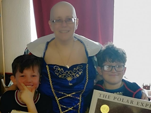 Disney Princess Kelly Brawn with her boys Barry Bennett from the Parent Agency, and another about to board the Polar Express.