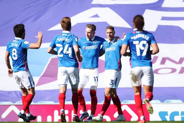 Pompey celebrate Ronan Curtis' strike that helped them to a 2-1 Good Friday win over Rochdale / Picture: Joe Pepler