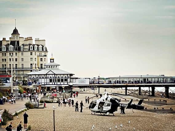 The air ambulance landed on the beach on Eastbourne seafront. Photo by John Hesse