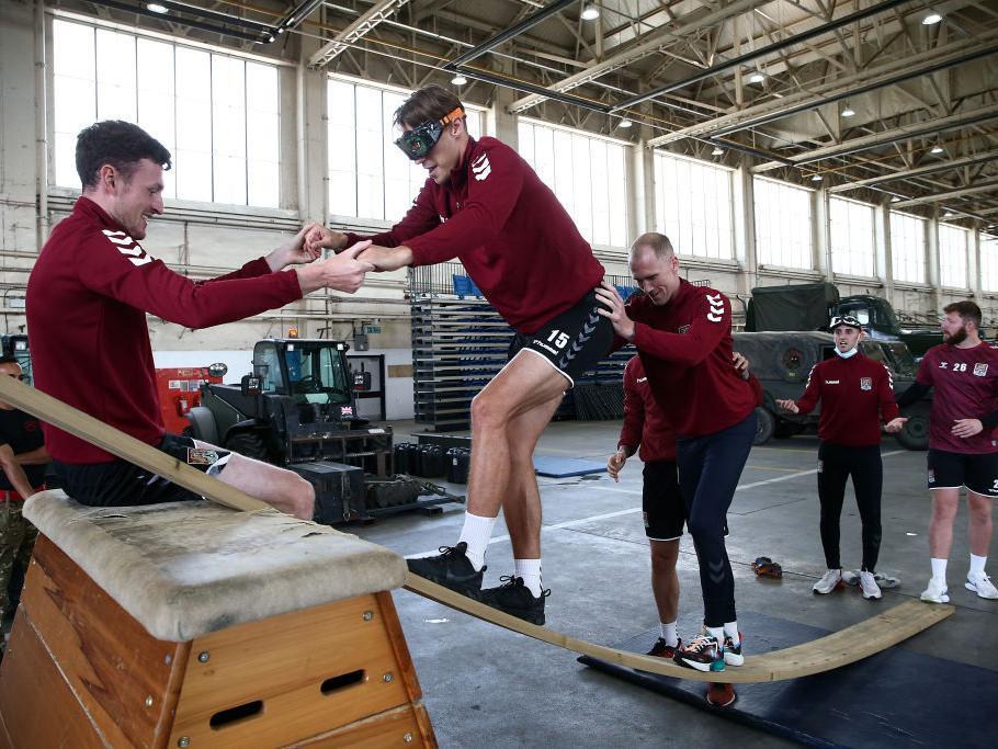 Sid Nelson is helped up during one exercise. Pictures: Pete Norton.