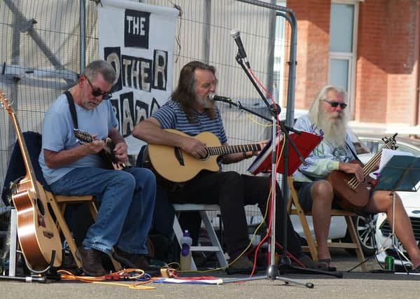 The Other Band playing a free concert on Bexhill seafront in aid of Warming Up The Homeless. Photo by Derek Canty SUS-210927-070901001