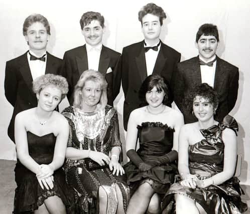 Seated, from left, Deirdre Campbell, Michelle Quigley, Roisin Doherty and Gillian Doherty. Standing are Charles Morrison, Adrian Cooke, Declan McCafferty and Patrick McGilloway.