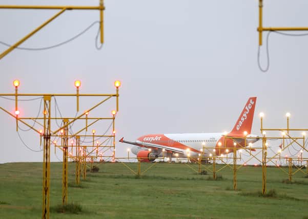 PACEMAKER, BELFAST, 15/6/2020: The Easyjet flight to Liverpool prepares to leave Belfast International airport this morning