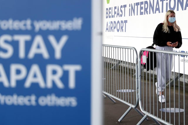 PACEMAKER, BELFAST, 15/6/2020: A passenger arrives at Belfast International airport this morning for the first domestic flight to leave the airport since it was shut down after Coronavirus restrictions were put in place