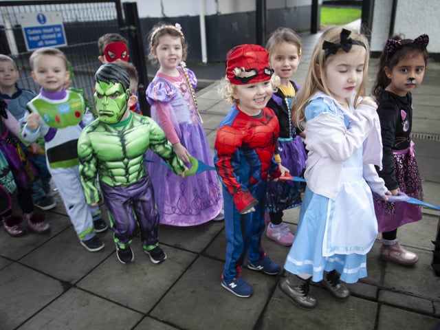 Nursery children make their way to the parade at Hollybush on Wednesday morning.