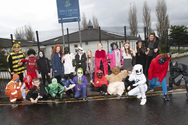 Mrs. McNulty with her P7 class at Hollybush PS on Wednesday, before they paraded around the area in their Halloween garb. On left at back is Mrs. Teresa Duggan, Principal. (Photos: Jim McCafferty Photography)