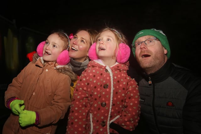 The Oâ€TM Kane family from Draperstown, enjoying the light extravaganza at Illuminate Derry. From left are Emma (7), Sinead, Lucy (5) and James.