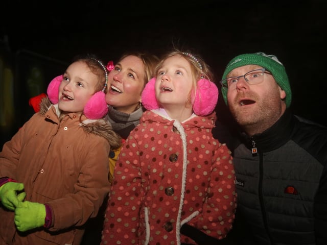 The Oâ€TM Kane family from Draperstown, enjoying the light extravaganza at Illuminate Derry. From left are Emma (7), Sinead, Lucy (5) and James.