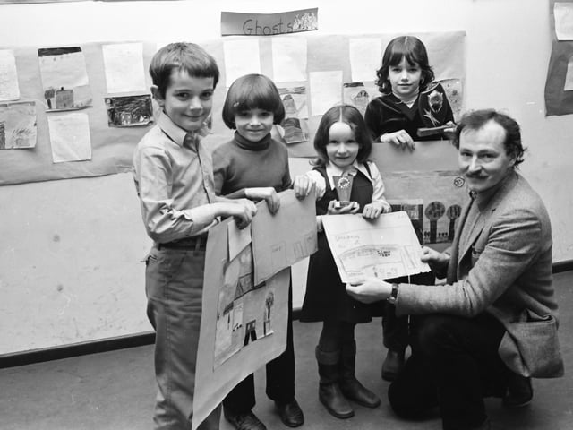 Mr. Declan McGonagle, Derry Arts Council, presents trophies and Co-Op shares to the winners of the Galliagh Co-Op painting competition. From left to right, Damien McColgan, Stephen Wright, Sinead Wright and Margaret McMonagle.