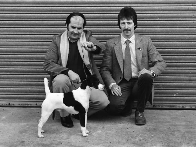 Bankend Serene, owned by Daniel and Donal Kearney, Grafton Street, Derry, winner of the Limit Dog Smooth Fox Terrier Class at Cruft’s. In picture are Bob Barron, who prepared and handled Bankend Serene for the show, and Donal Kearney, joint owner.