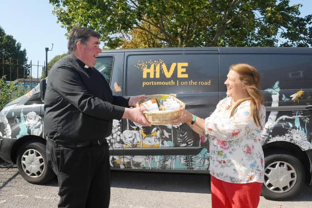 The launch of the Harvest Appeal, encouraging people to donate food tins.
Pictured is: Father Bob White with Fratton residentMaggie Moles.
Picture: Sarah Standing (140920-3998)