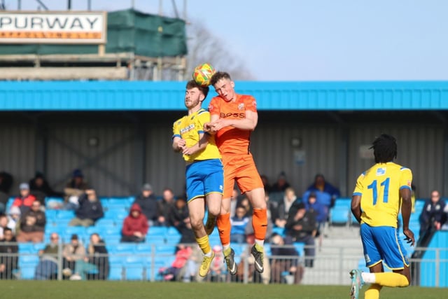 Gosport's Harvey Rew rises for a header against Hartley Wintney. Picture by Tom Phillips