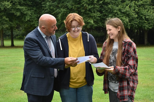 Exec head Chris Willis with Emily Slight and Lizzie Wood at Bay House on GCSE results day