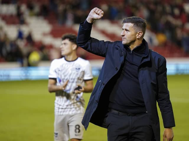 John Mousinho savours the impressing 3-2 triumph at Barnsley which has lifted Pompey to the top of League One. Picture: Jason Brown/ProSportsImages
