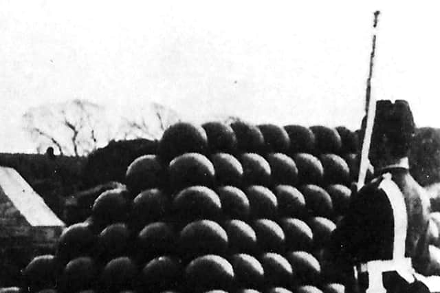 A pile of cannonballs found in the area surrounding the Royal Garrison Church that were used in the defence of the town. Picture: Barry Cox collection.