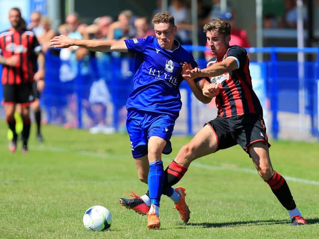 Kelvin Robinson, left, conceded the penalty which allowed Badshot Lea to take a 2-0 FA Vase lead.
Picture: Chris Moorhouse