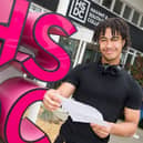 Pictured: Kenzie Martyn opening his results.