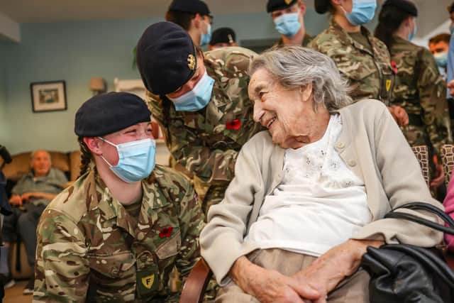 20 soldiers from Fox Platoon at Army Training Regiment Winchester came in to visit the residents of Encore's Hamble Heights Care Home and chat to them ahead of Remembrance Day:Care home residents at Hamble Heights welcomed army recruits