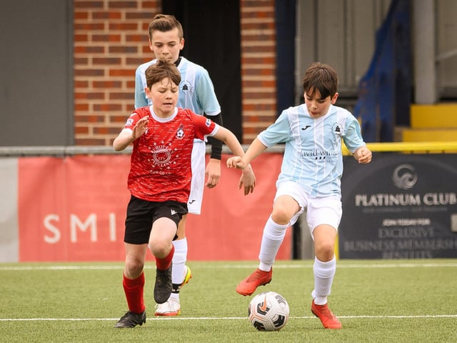 Action from the Portsmouth Youth League Geldard Invitation Cup final between Jubilee 77 U13s and Castle United U13s (light blue and white kit). Picture: Keith Woodland (190321-656)