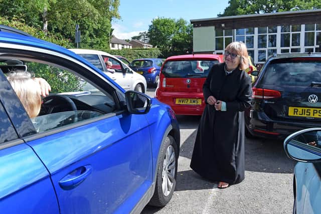 Reverend Claire Towns, of St Barnabas Church, led the unique drive-in service. Picture: Simon Czapp/Solent News
