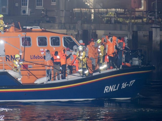 Over 100 illegal migrants aboard two RNLI lifeboats entered Portsmouth Harbour on Sunday evening just after 10pm, heading for Fort Blockhouse in Gosport, Hampshire where teams from the Home Office were there to welcome the migrants. They were then heading to board one of a number of buses waiting for them. Pictured passing Fort Blockhouse.   Please credit: pictureexclusive.com