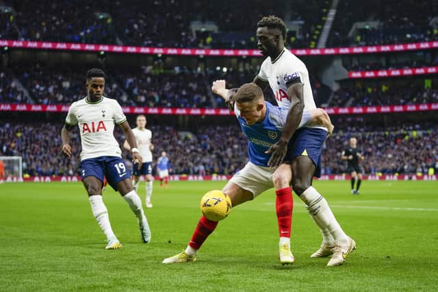 Colby Bishop holds off Spurs' Davinson Sánchez during their FA Cup third-round encounter. Picture: Jason Brown/ProSportsImages