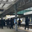 Protesters at Dover Priory train station after black-clad and masked anti-illegal migrant demonstrators blocked roads in Dover during a protest. Picture date: Saturday September 5, 2026.