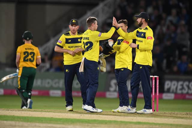 Mason Crane celebrates taking the wicket of Tom Moores as Notts start to collapse. Photo by Tony Marshall/Getty Images.