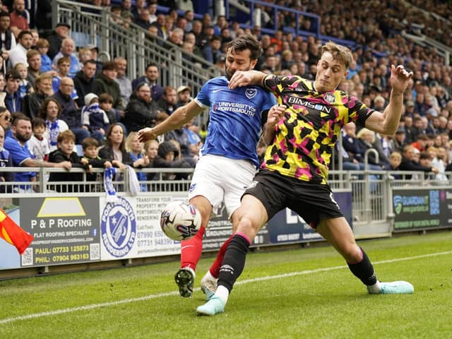 Joe Rafferty is a doubt for Pompey's trip to Port Vale. He is nursing a neck injury. (Image: Camera Sport)