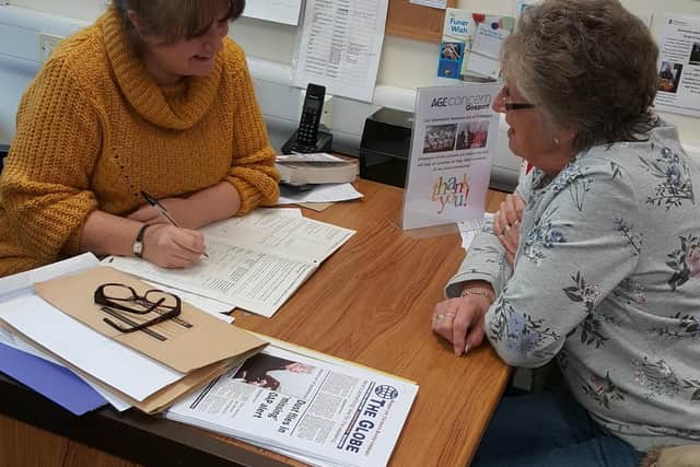 Gosport Voluntary Action's Community Compass and its dedicated team of
volunteers offer free confidential signposting consultations for those in need. Pictured: Coordinator Angela Gould with an anonymous client