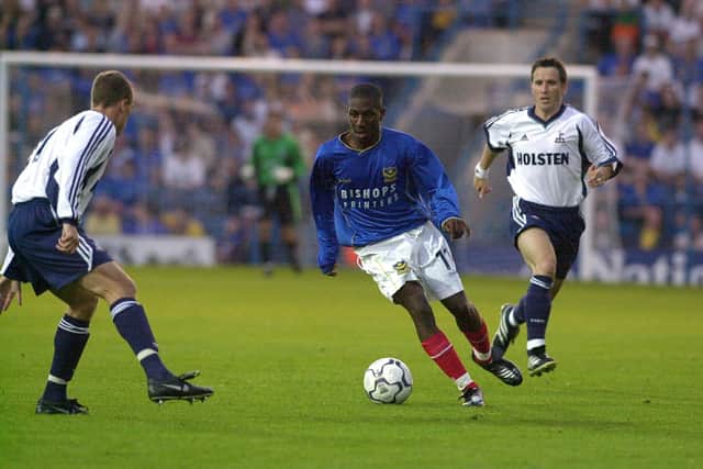 Courtney Pitt, seen here taking on Spurs' Chris Perry in a July 2001 pre-season friendly, made 41 appearances for Pompey. Picture: Steve Reid