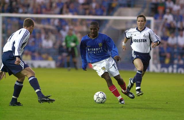 Courtney Pitt, seen here taking on Spurs' Chris Perry in a July 2001 pre-season friendly, made 41 appearances for Pompey. Picture: Steve Reid