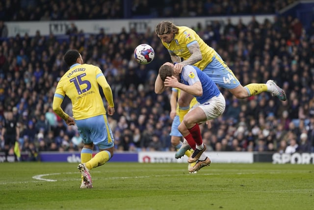 Colby Bishop feels the full force of Aden Flint against Sheffield Wednesday. Picture: Jason Brown/ProSportsImages
