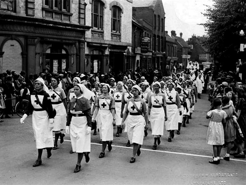 Sent in by  Richard Boryer of Havant we see members of the Havant Red Cross marching up South Street in Havant. The date is July 1941 and leading the marching party in the dark dress is a Miss Paxman. To her right as we look with the collar is Mrs Weeks and over Miss Paxman's shoulder is Miss Binford-Norman.