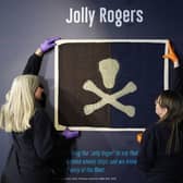 The earliest known surviving example of a Royal Navy submarine Jolly Roger, flown from HMS E54 during the First World War, is installed as part of a Jolly Roger display at the Royal Navy Submarine Museum in Gosport. Photo: Andrew Matthews/PA Wire
