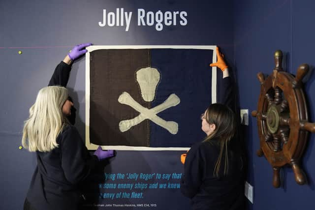 The earliest known surviving example of a Royal Navy submarine Jolly Roger, flown from HMS E54 during the First World War, is installed as part of a Jolly Roger display at the Royal Navy Submarine Museum in Gosport. Photo: Andrew Matthews/PA Wire