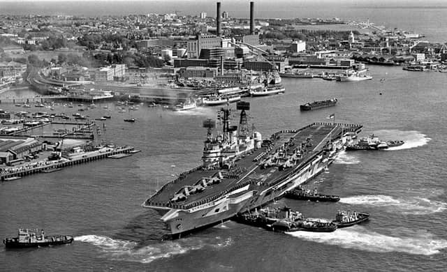 A marvellous photograph from Mike Nolans collection. HMS Ark Royal berthing at South Railway Jetty in 1972.