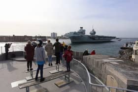 Crowds gather at The Round Tower to watch HMS Queen Elizabeth depart from Portsmouth on April 29. Photo: Habibur Rahman