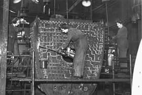 Women work on the loco boiler in 1942