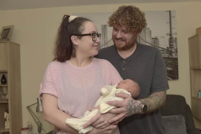 Kirsty McLaughlin (35) from Gosport, gave birth to her second son Ellis Holloway on Saturday January 14, 2023 on Portsdown Hill with her partner Owen Holloway (35) who delivered the baby and dad Ray Laughlin (59) directed traffic and the ambulances.Picture: Sarah Standing (190123-8473)
