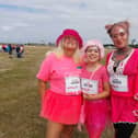 From left, Christine Whittingham, 61, Tilly Phillips, 12 and Sophia Whittingham, 34, at the Race for Life in Southsea. Picture: David George