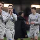 Ryan Williams and Tom Naylor applaud the Pompey away fans after the loss at Fleetwood Town. Picture: Daniel Chesterton/phcimages.com