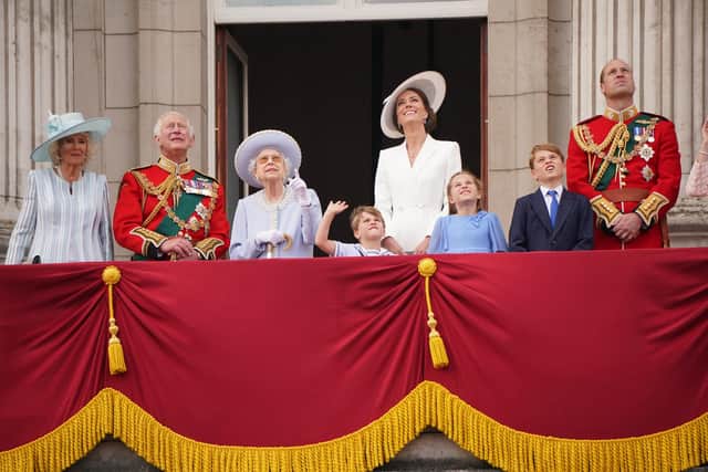 (Left to right) The Duchess of Cornwall, the Prince of Wales, Queen Elizabeth II , Prince Louis, the Duchess of Cambridge, Princess Charlotte, Prince George, and the Duke of Cambridge on the balcony of Buckingham Palace, to view the Platinum Jubilee flypast, on day one of the Platinum Jubilee celebrations. Picture date: Thursday June 2, 2022.