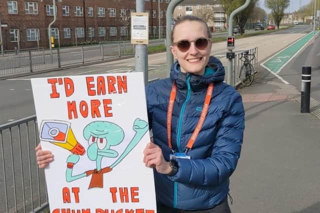 Junior doctor Bea Gardner on strike outside QA Hospital on Tuesday. Picture by Joe Buncle